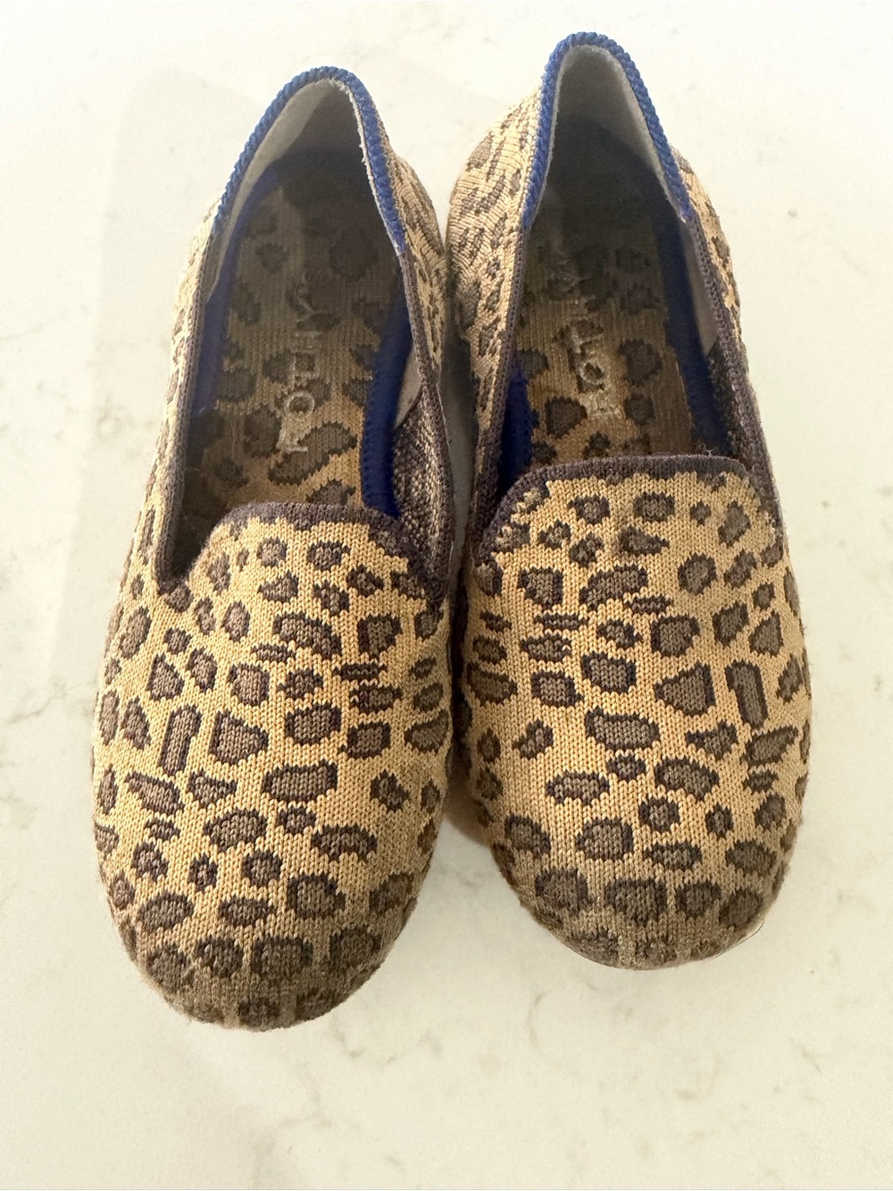Rothy's Kids Leopard Print Slip-On Flats in Tan and Brown with Blue Trim